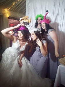 Group posing at a magic mirror